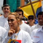 Tintori, wife of jailed opposition leader Leopoldo Lopez, gestures next to her mother-in-law Mendoza as they take part in a rally to honour victims of violence during a protest against Venezuela’s President Nicolas Maduro’s government in Caracas